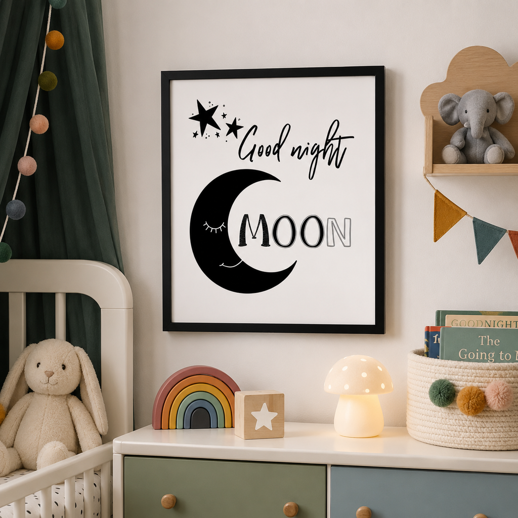 Monochrome nursery print with a crescent moon and stars, 'Good night moon', framed on a shelf