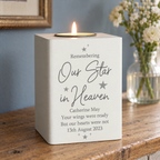 Personalised Our Star in Heaven memorial tea light holder with a lit candle