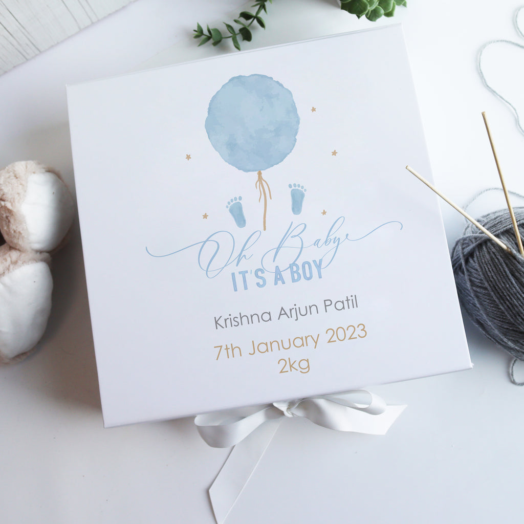 Personalised white luxury baby gift box with watercolour balloon and bear design, customised with baby name, birth date, and weight.