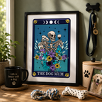 Framed tarot style print 'The Dog Mum' with skeleton, wine and flowers, on a shelf