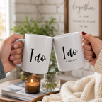 Funny couples wedding mug set reading 'I do' and 'I do as I am told' held by a couple