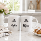 Personalised wedding mug set reading 'Mr Hipkiss' and 'Mrs Hipkiss' on a kitchen worktop