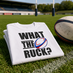 White rugby t-shirt featuring the 'What The Ruck?' print, worn by a rugby fan