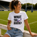 White rugby t-shirt printed with 'What The Ruck?' and a rugby ball graphic, worn pitchside
