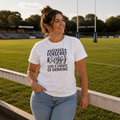 White rugby t-shirt printed with 'Weekend Forecast Rugby With A Chance Of Drinking', worn pitchside
