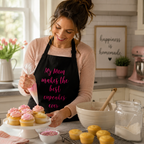 Personalised black baking apron worn while baking cupcakes