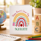 Personalised back to school card with rainbow, pencils and a name for a special first day