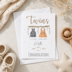 Personalised twins new baby card with watercolour dungarees and dress, names and birth date