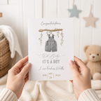Personalised new baby boy card with watercolour dungarees design