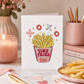 Valentine's card with a chip carton reading 'Time fries' and 'xoxo'