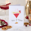 Christmas card with a pink cocktail and sparkler illustration, 'Merry Christmas'