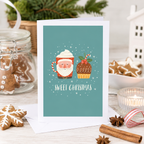 'Sweet Christmas' card with a Santa cup and Christmas pudding illustration on a teal background