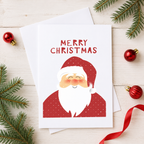 'Merry Christmas' Santa card with a smiling Father Christmas in a red spotty suit on white