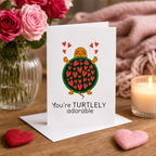 Turtle Valentine's card with hearts, styled with a croissant and roses