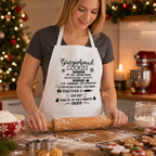 White Christmas apron printed with a 'Gingerbread Cookies' recipe, worn while baking