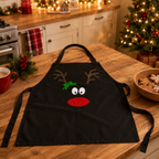 Reindeer face Christmas apron in black with antlers, holly and a bright red nose