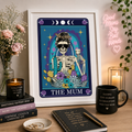 Framed tarot style print 'The Mum' with skeleton holding wine and cactus, in a styled corner