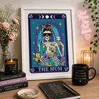 Framed tarot style print 'The Mum' with skeleton holding wine and cactus, in a styled corner