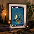 Cheeky tarot style print 'The Sass' framed and styled with candles