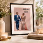 Personalised paper first anniversary print of a couple with 'Mr & Mrs Firth', framed on a shelf