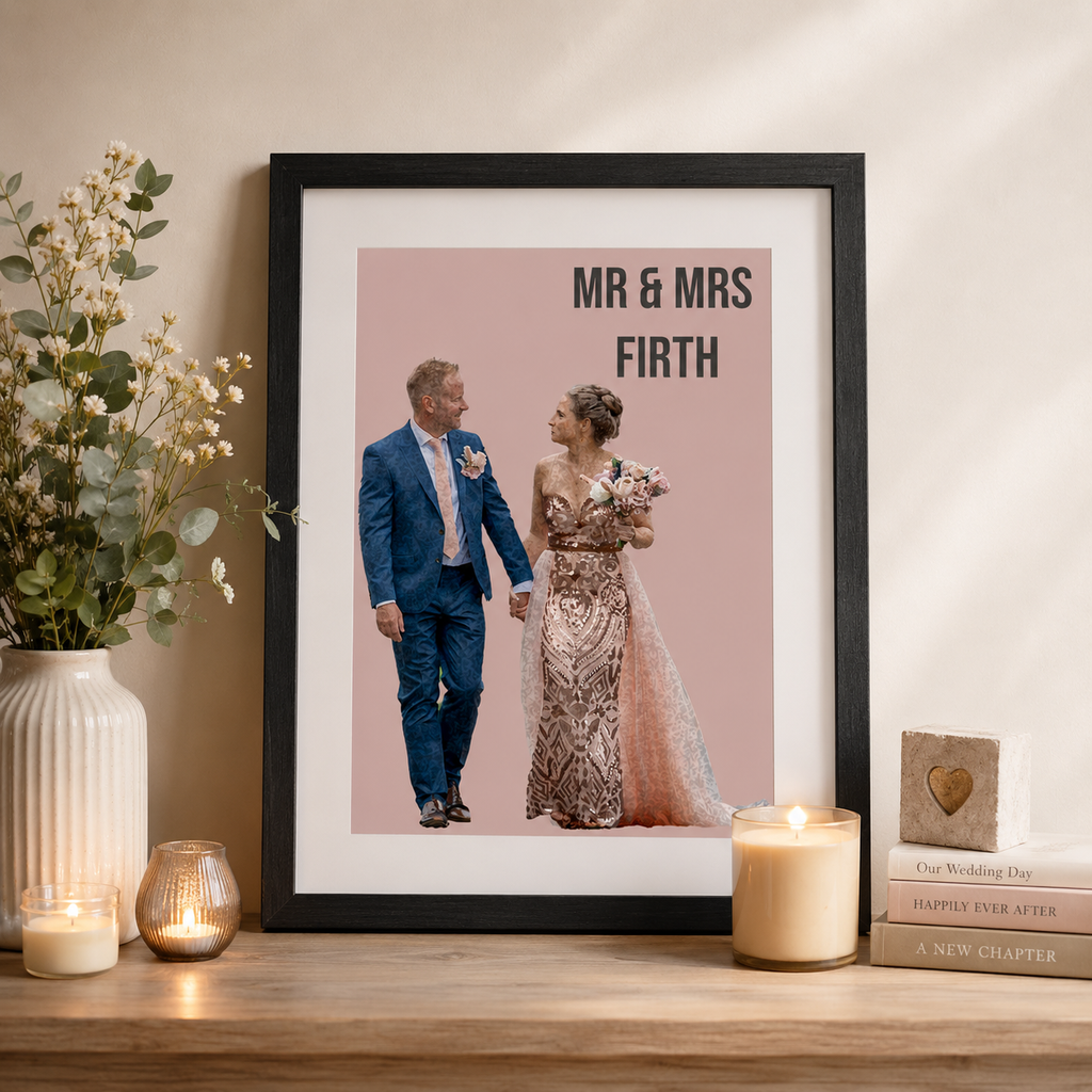 Personalised first anniversary print of a couple in cartoon style, framed as a keepsake