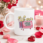 White Valentine's mug with a retro matchbox reading 'We are a perfect match', on a marble surface