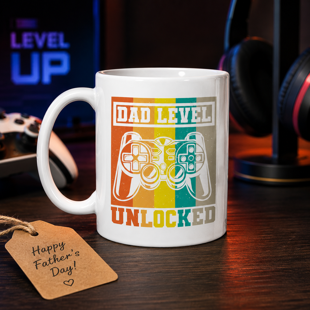 White mug with retro game controller and 'Dad level unlocked'