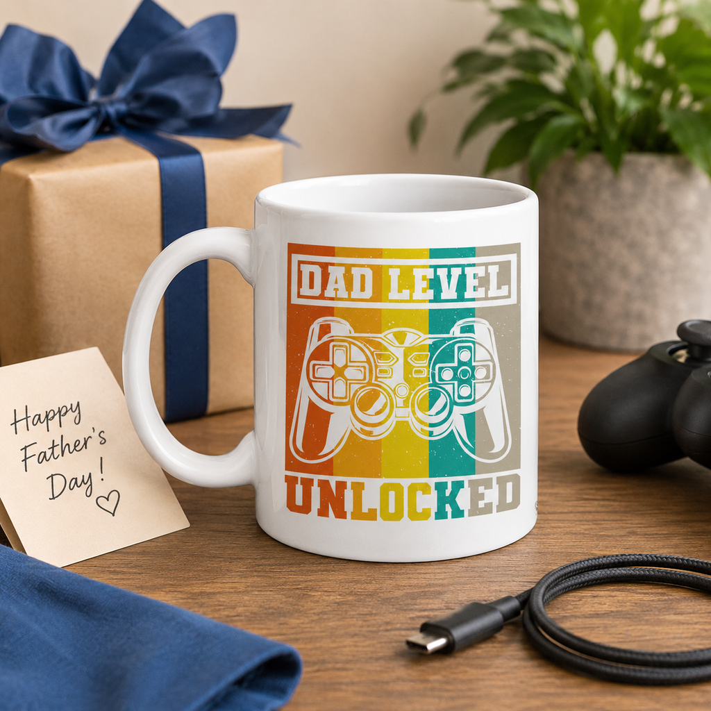 Retro 'Dad level unlocked' game controller mug in white