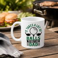 Funny golf mug reading 'It takes a lot of balls to golf like Dad' with golf club design