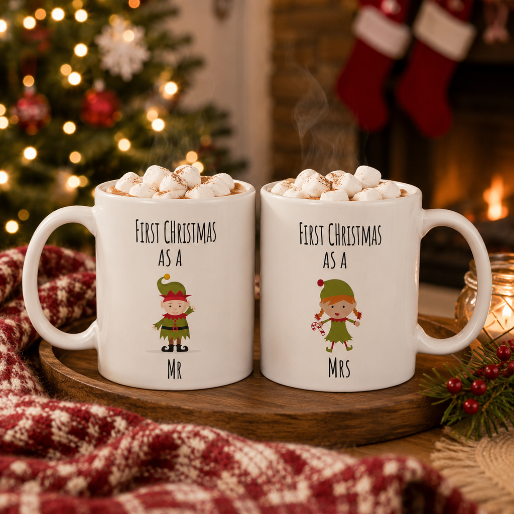 Couples mug set printed 'First Christmas as a Mr' and 'Mrs' with elf characters and hot chocolate