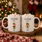 Couples mug set printed 'First Christmas as a Mr' and 'Mrs' with elf characters and hot chocolate