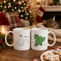 White Christmas mug with a cat tangled in fairy lights reading 'Meowy Christmas', in a cosy setting