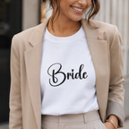 White bride sweatshirt with 'Bride' in black script, worn under a beige blazer