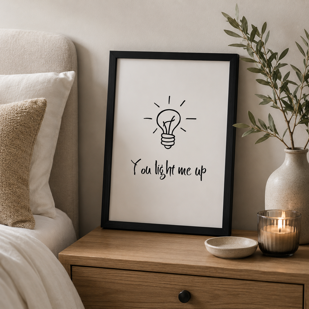 Minimalist 'You light me up' wall art print in a simple frame