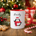Personalised Christmas mug with red inner, festive penguin and the name 'Emily' above it