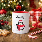 Personalised Christmas mug with red inner, festive penguin and the name 'Emily' above it