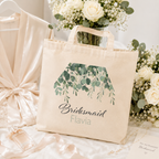 Personalised bridal party tote bag with a green botanical leaf design, natural canvas