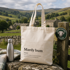 Cotton tote bag printed with a 'Mardy bum' dictionary definition, by a Yorkshire Dales gate