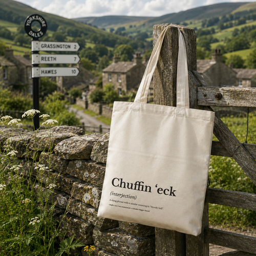 Cotton tote bag printed with a 'Chuffin'eck' dictionary definition, hung on a Yorkshire Dales gate