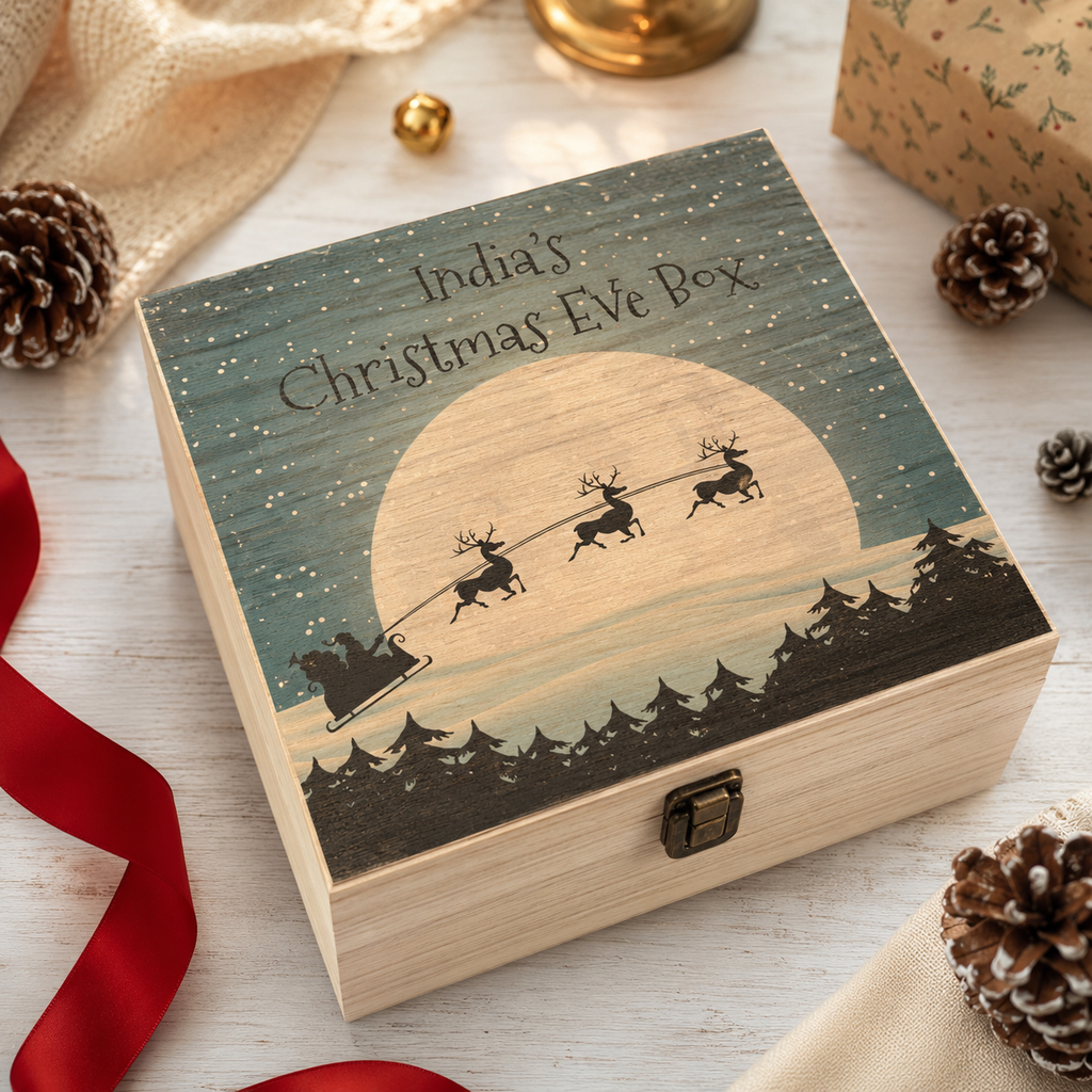 Personalised wooden Christmas Eve box with a moonlit sleigh design and custom name