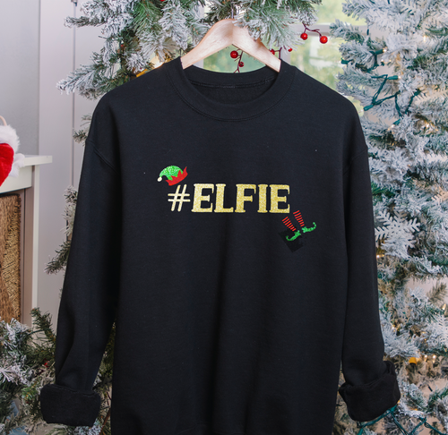 Festive Christmas Jumper Day sweatshirt with sparkling elf motif