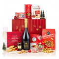 The Redsleeves Hamper with Prosecco, featuring Accademia Prosecco, mince pies, popcorn and jam by a red Christmas gift box