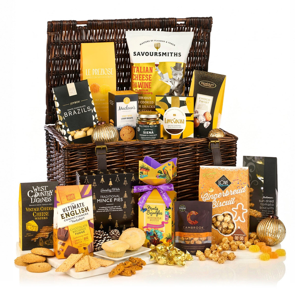 The Fireside Feast Hamper (Alcohol Free) with chocolate, fudge, cheese wafers, popcorn, mince pies and fruit jellies in a brown basket