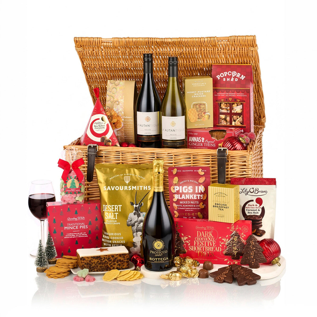 The Excelsior Gift Basket Hamper with Bottega Prosecco, red and white wine, mince pies, fruit cake and shortbread in a wicker basket