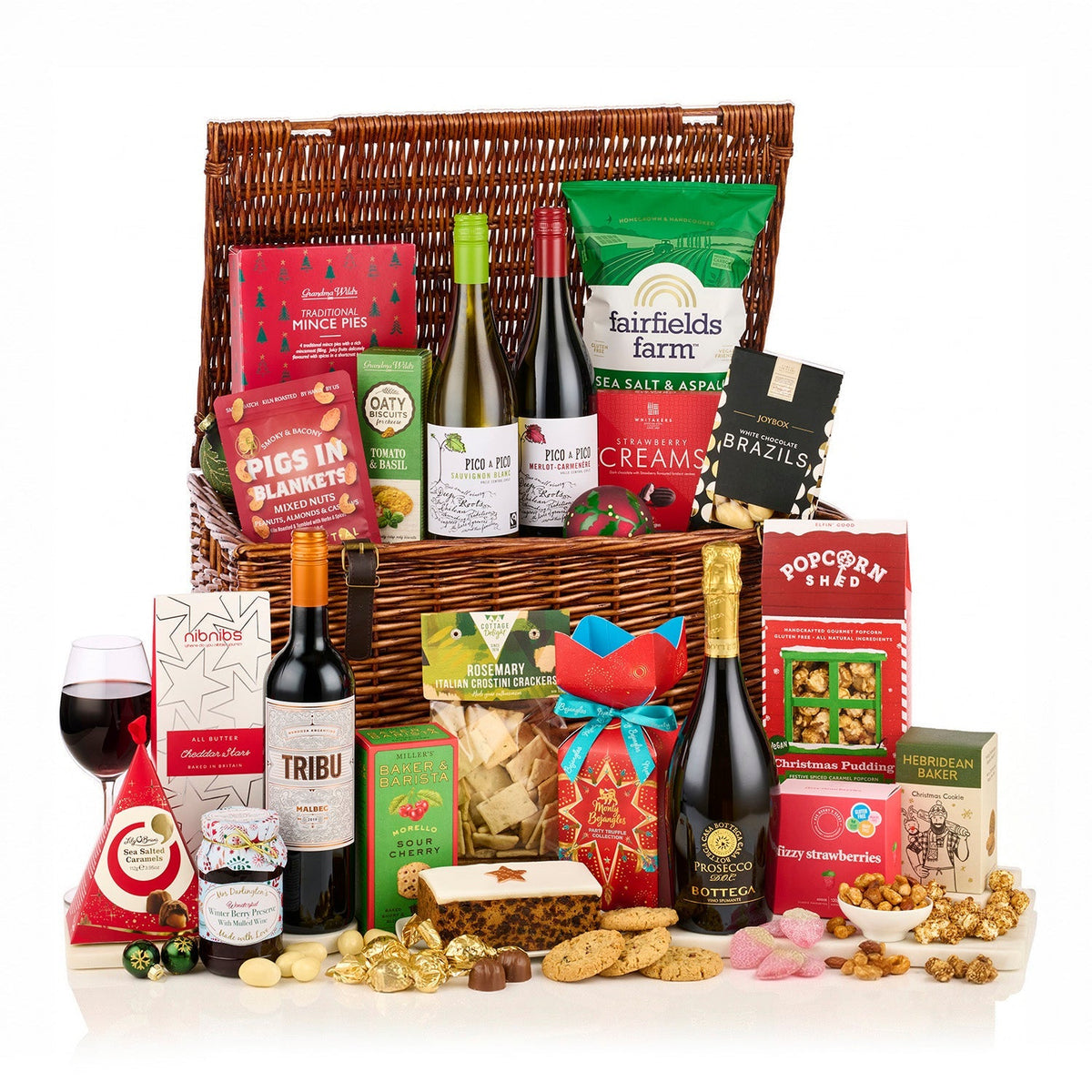 The Holly & The Ivy Hamper with Bottega Prosecco, Pico a Pico wines, a Malbec, mince pies, fruit cake and treats in a wicker basket