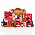 Yuletide Splendour Hamper with Champagne, Prosecco, red and white wines, shortbread, florentines and chocolates in a wicker basket