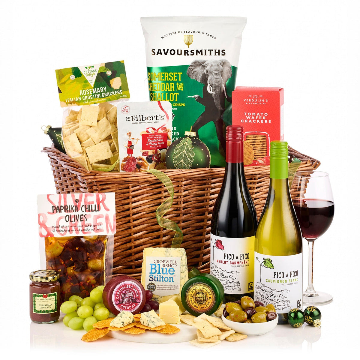 Festive Sharing Hamper with Pico a Pico red and white wine, Stilton, cheddars, crackers, olives and crisps in a wicker basket