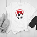 White t-shirt reading 'Just a girl who loves football' with a bow and football design