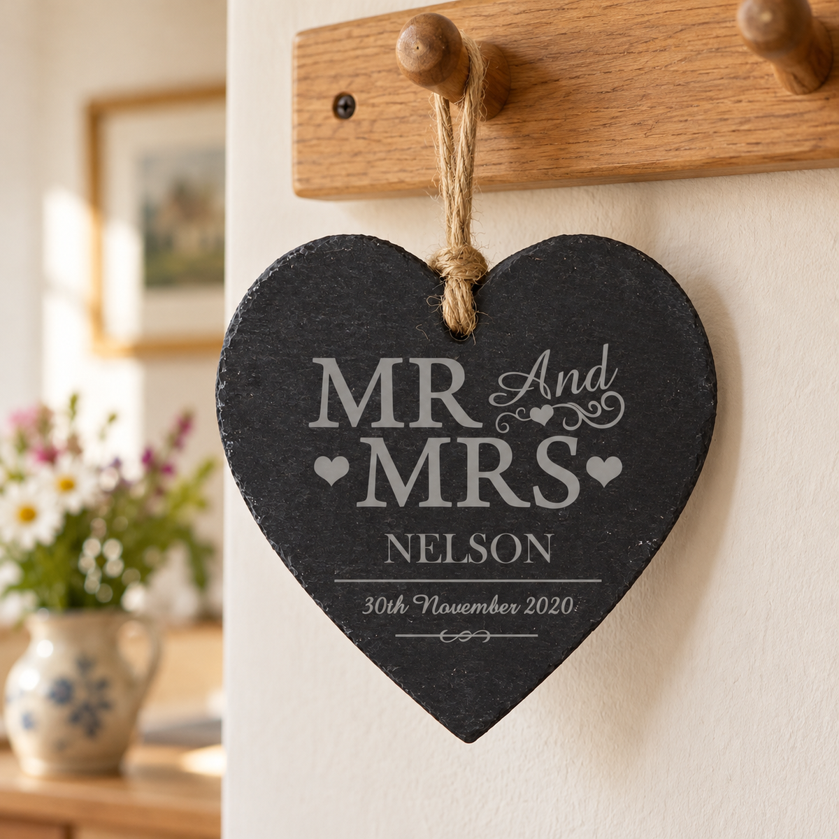 Personalised Mr & Mrs Slate Heart Decoration hanging on a peg rail