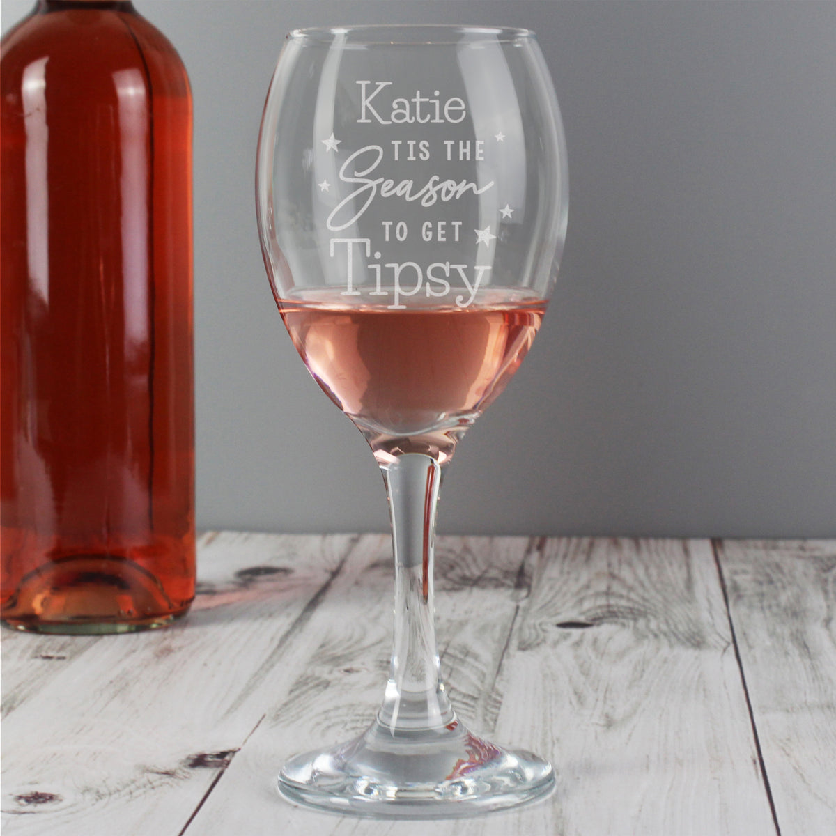 Personalised 'Tis The Season To Get Tipsy Wine Glass with personalised text, view 2